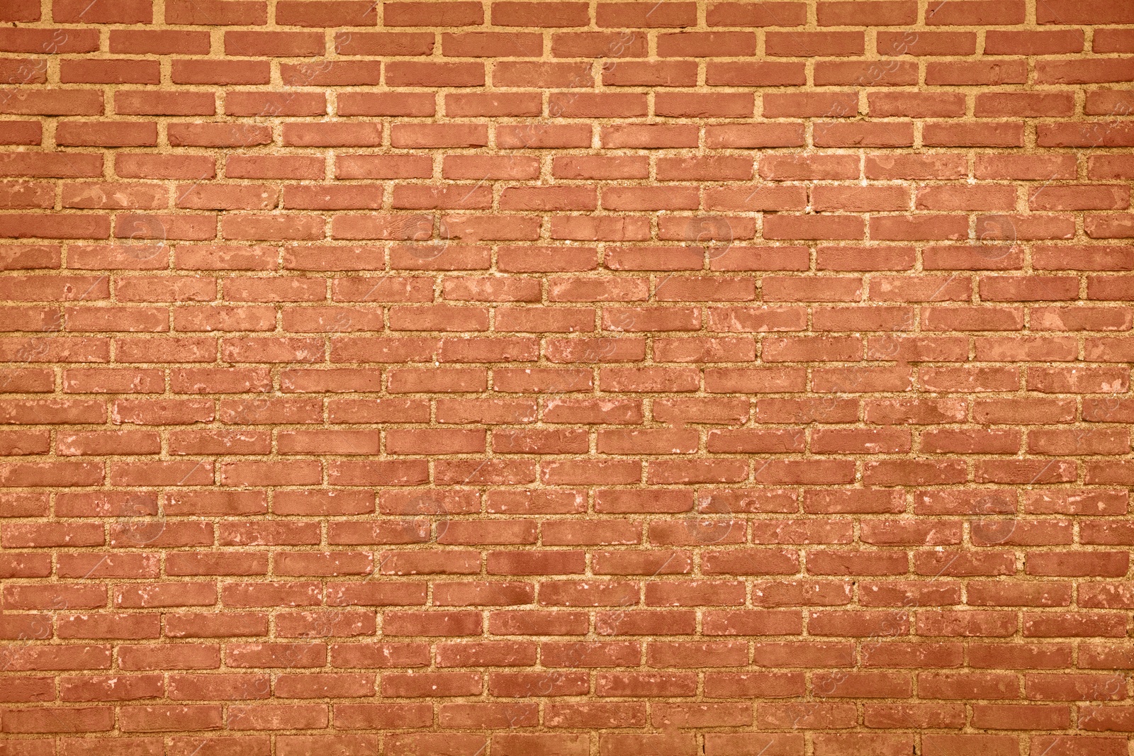 Image of Texture of bright orange brick wall as background