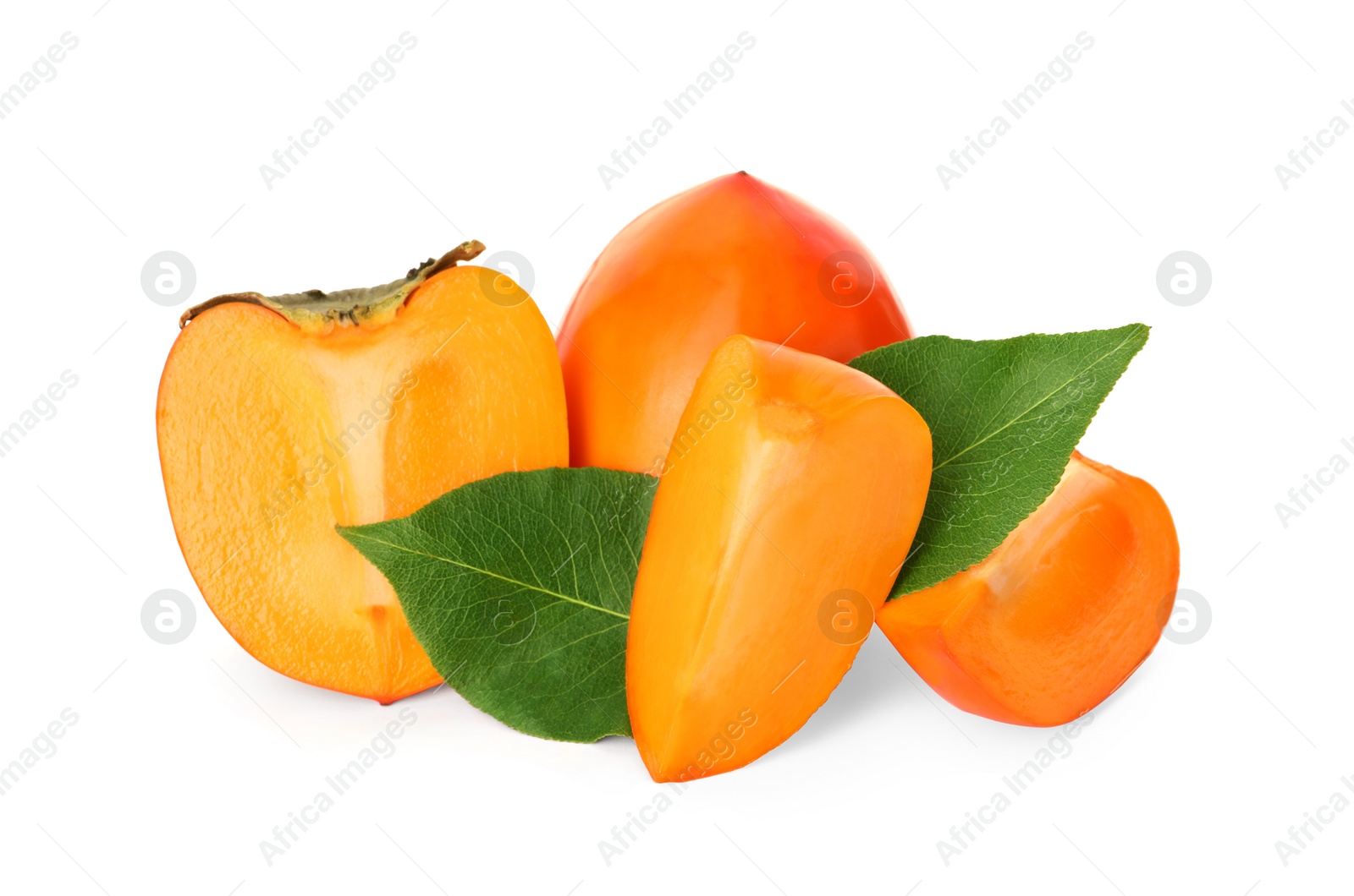 Photo of Whole and cut delicious ripe juicy persimmons on white background