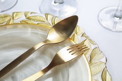 Elegant table setting on light background, closeup