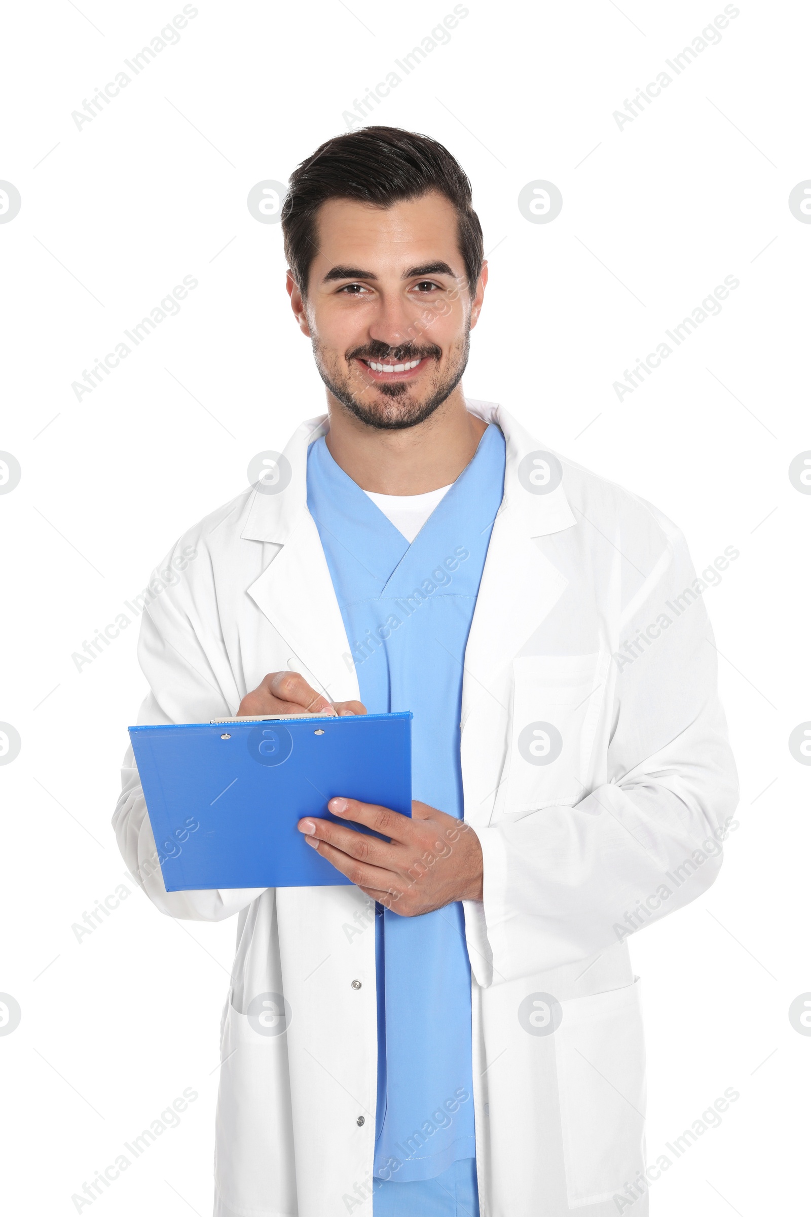 Photo of Young male doctor in uniform with clipboard on white background. Medical service
