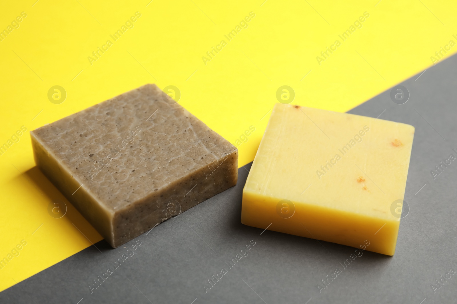 Photo of Hand made soap bars on color background