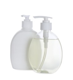 Dispensers of liquid soap on white background