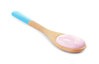 Photo of Spoon with yummy yogurt on white background