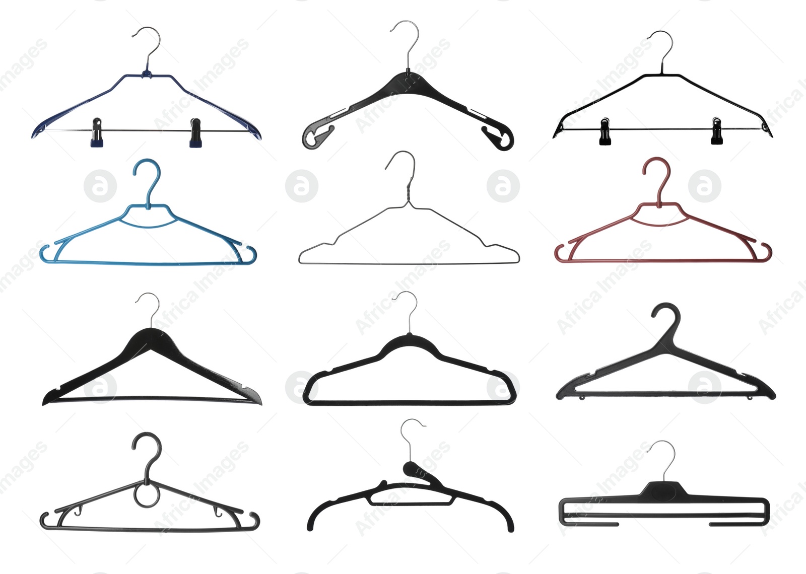 Image of Set with different empty hangers on white background