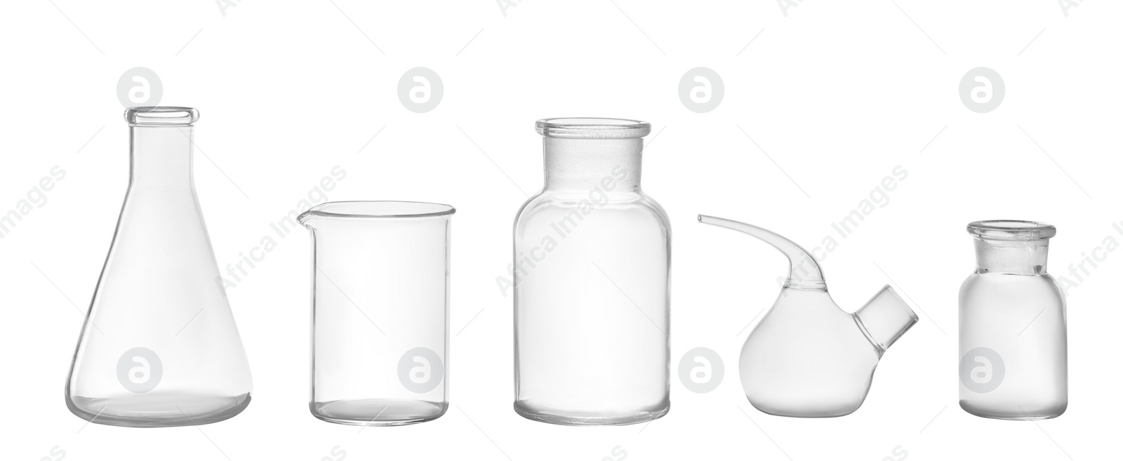 Photo of Clean empty laboratory glassware isolated on white