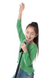 Photo of Little girl singing into microphone on white background