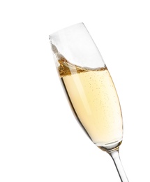 Photo of Glass of champagne on white background. Festive drink