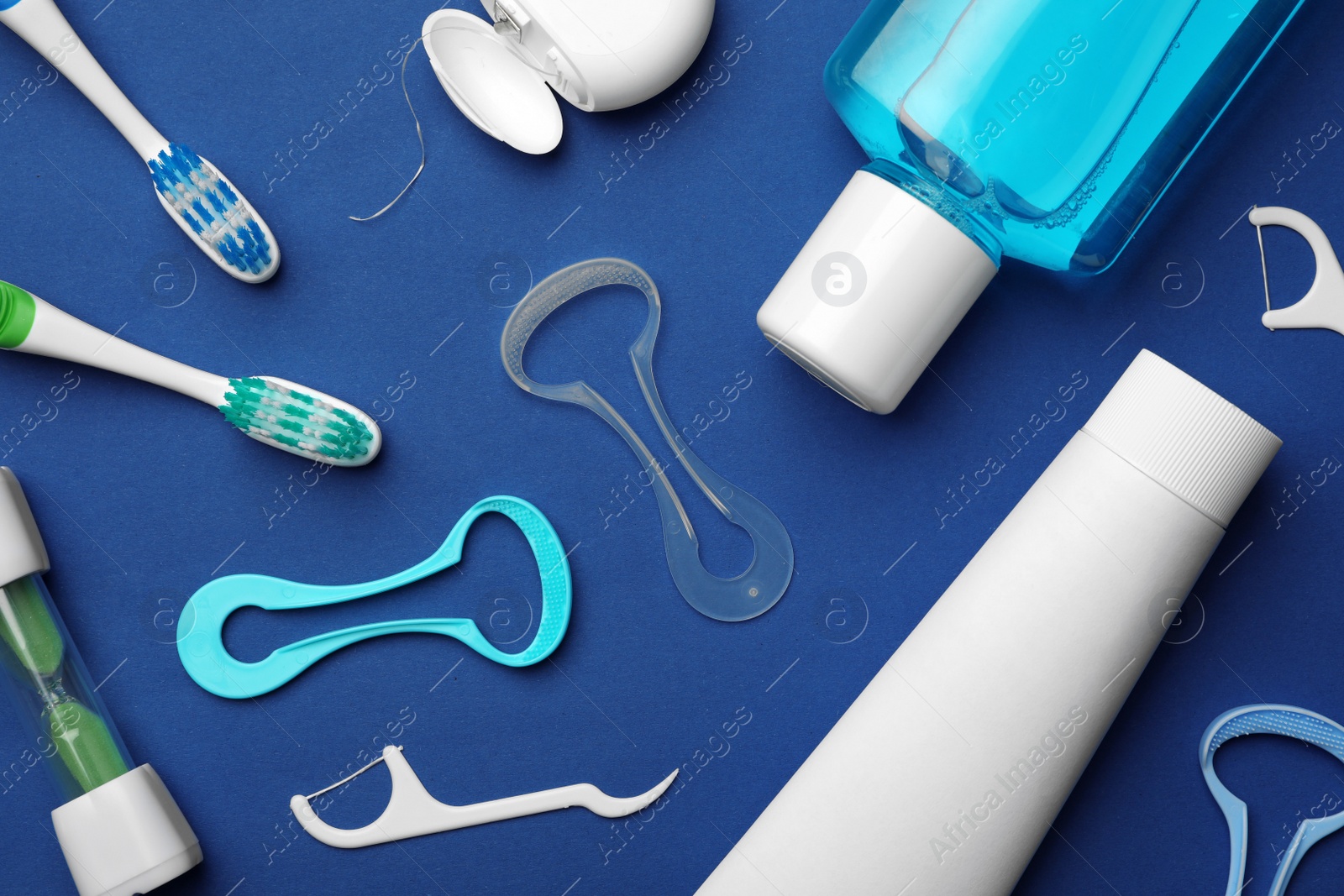 Photo of Flat lay composition with tongue cleaner on color background