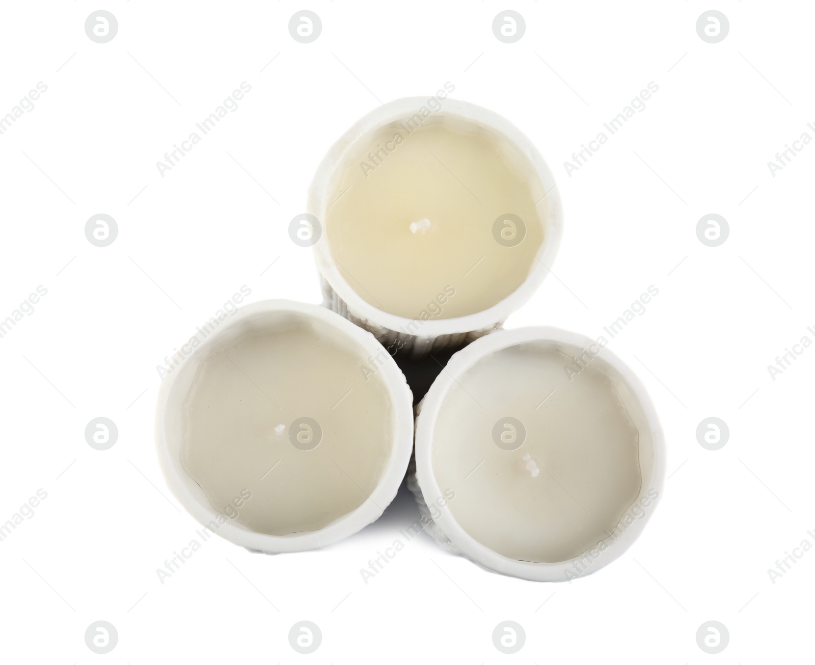 Photo of Candles in holders on white background, top view. Christmas decoration