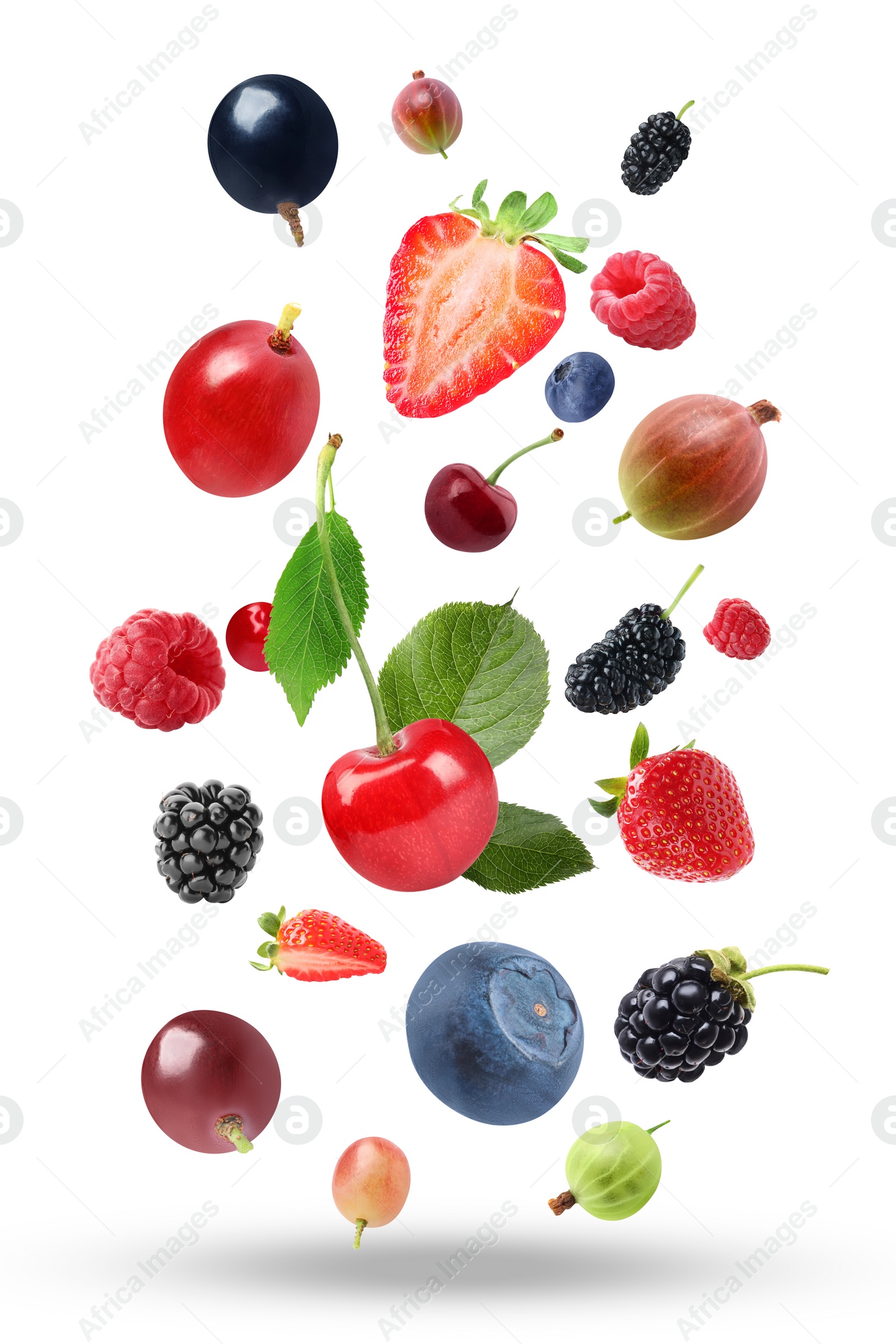 Image of Many different fresh berries falling on white background