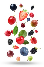 Image of Many different fresh berries falling on white background