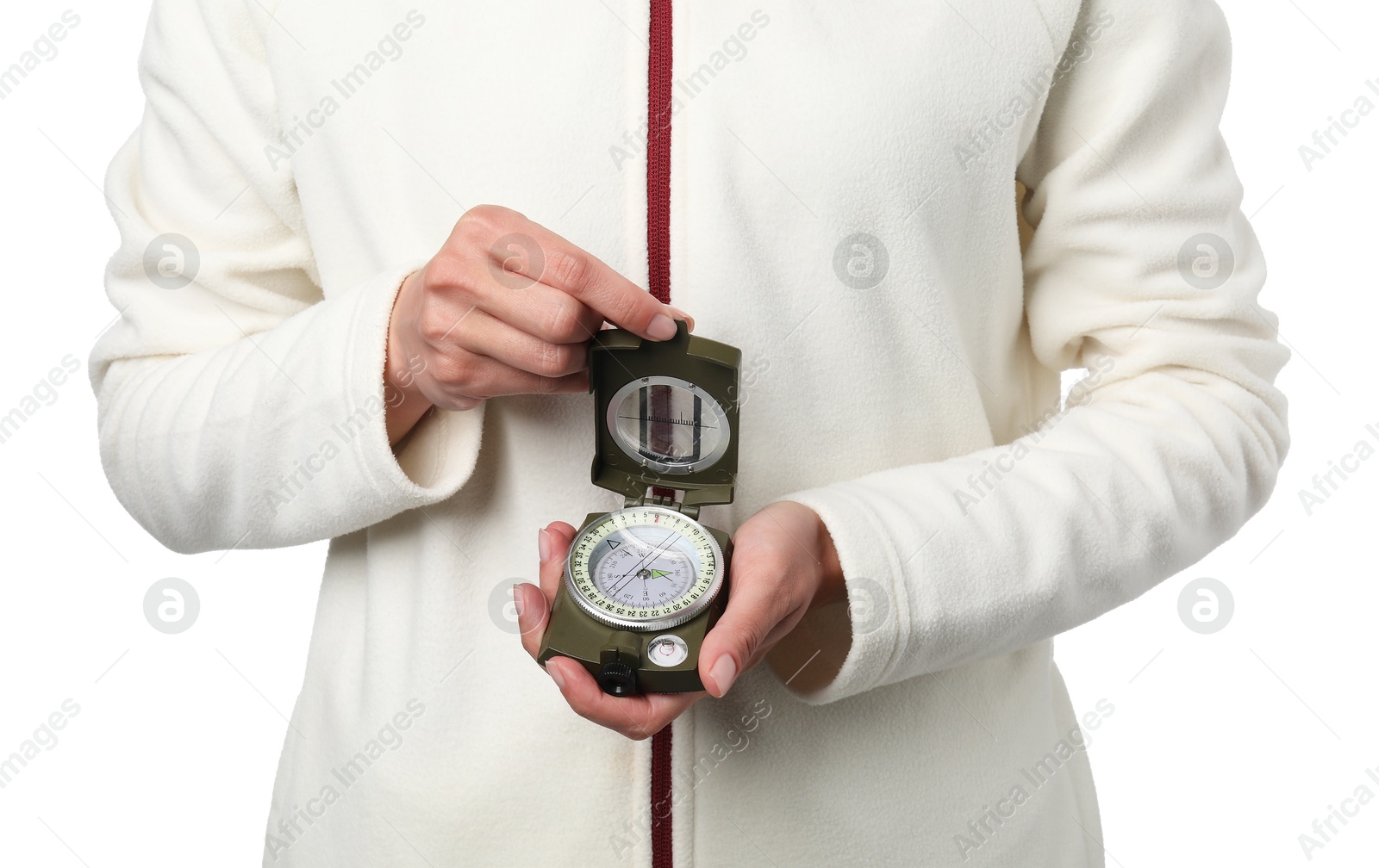 Photo of Woman holding compass on white background, closeup