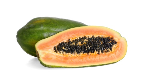 Fresh juicy ripe papayas on white background