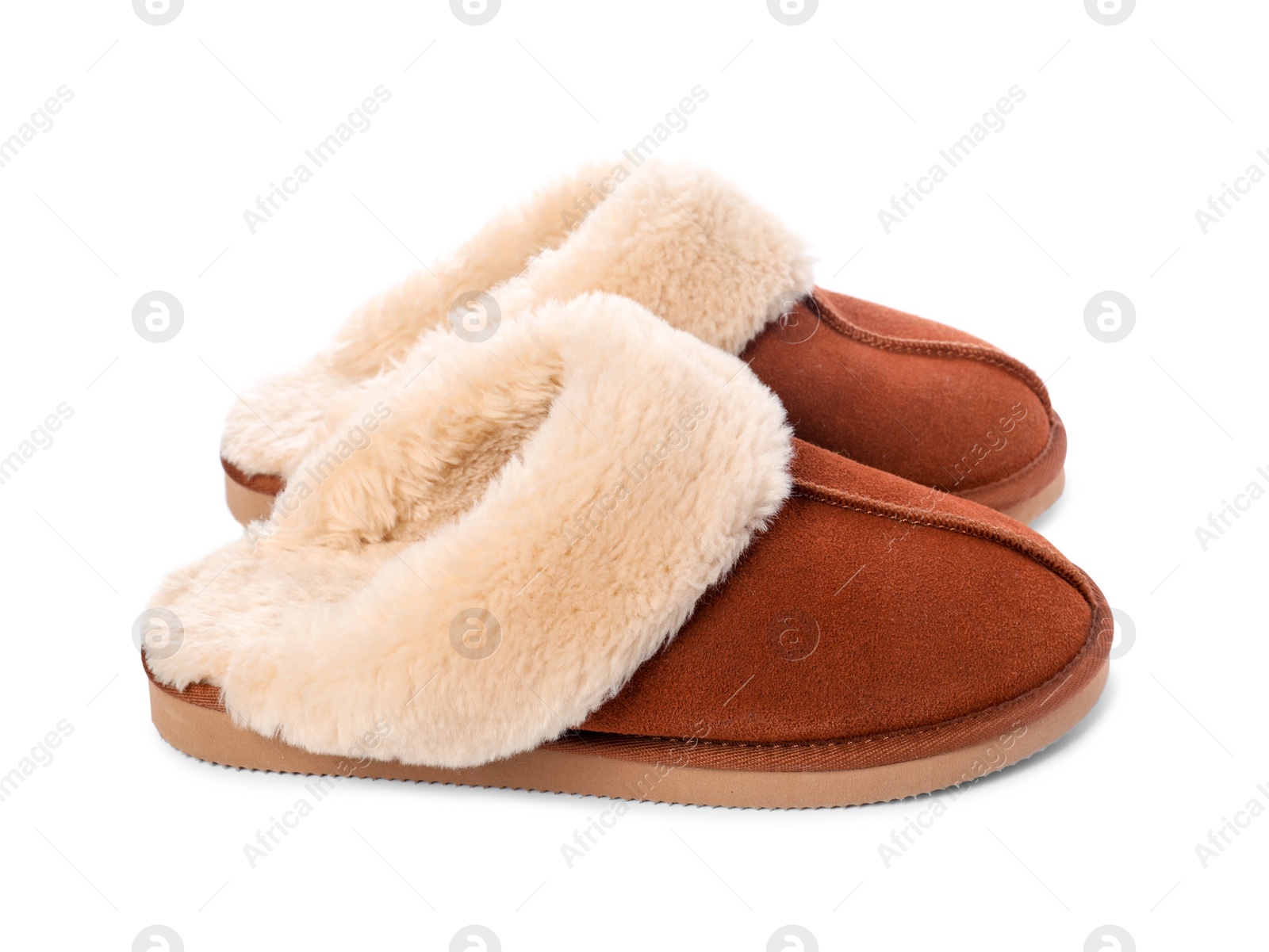 Photo of Pair of soft slippers with fur isolated on white