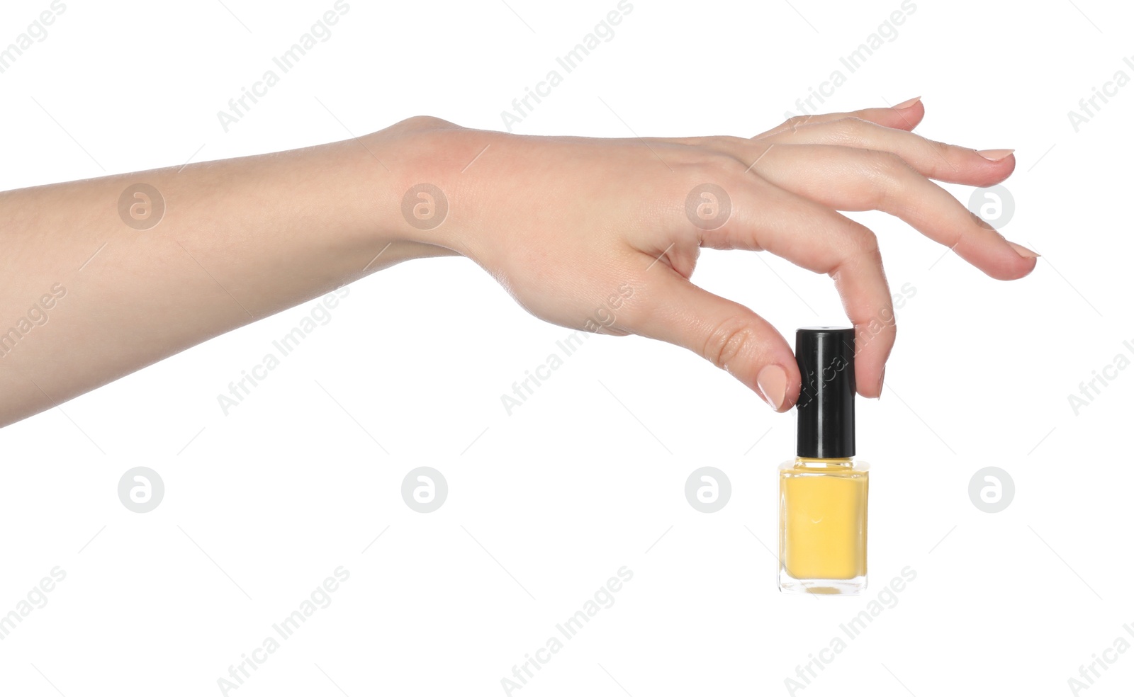 Photo of Woman holding nail polish on white background, closeup