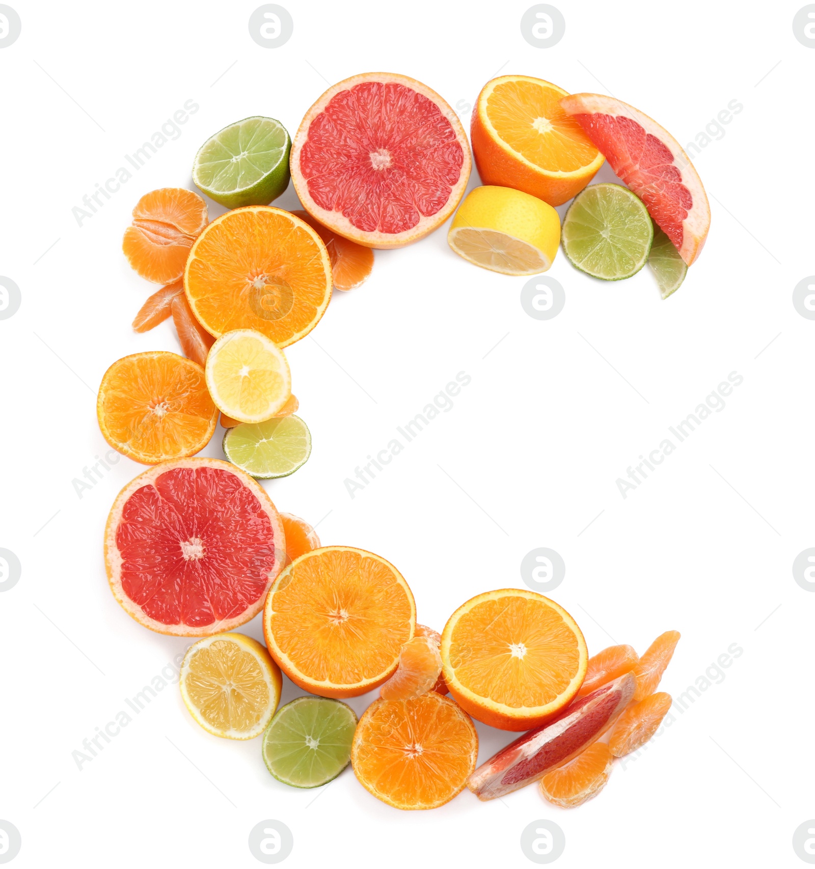 Photo of Letter C made with citrus fruits on white background as vitamin representation, top view