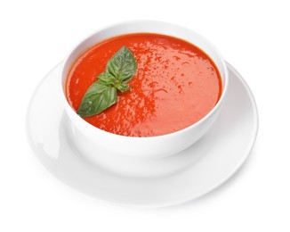Photo of Delicious tomato soup with basil isolated on white