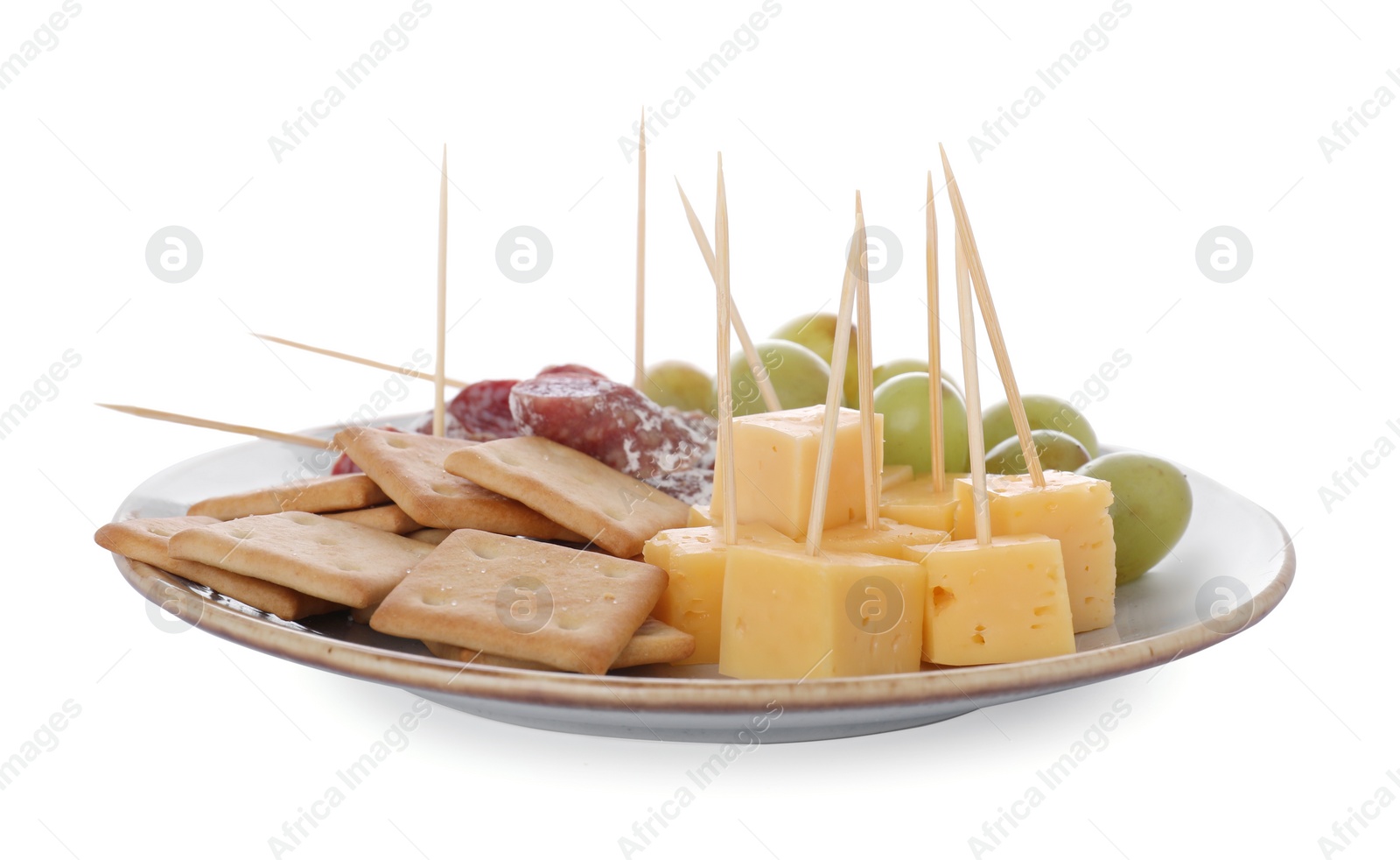 Photo of Toothpick appetizers. Tasty cheese, sausage, crackers and grapes on white background