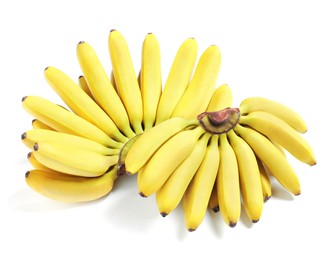 Photo of Bunches of ripe baby bananas on white background