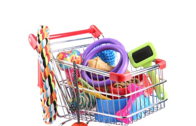 Different pet goods in shopping cart isolated on white. Shop items