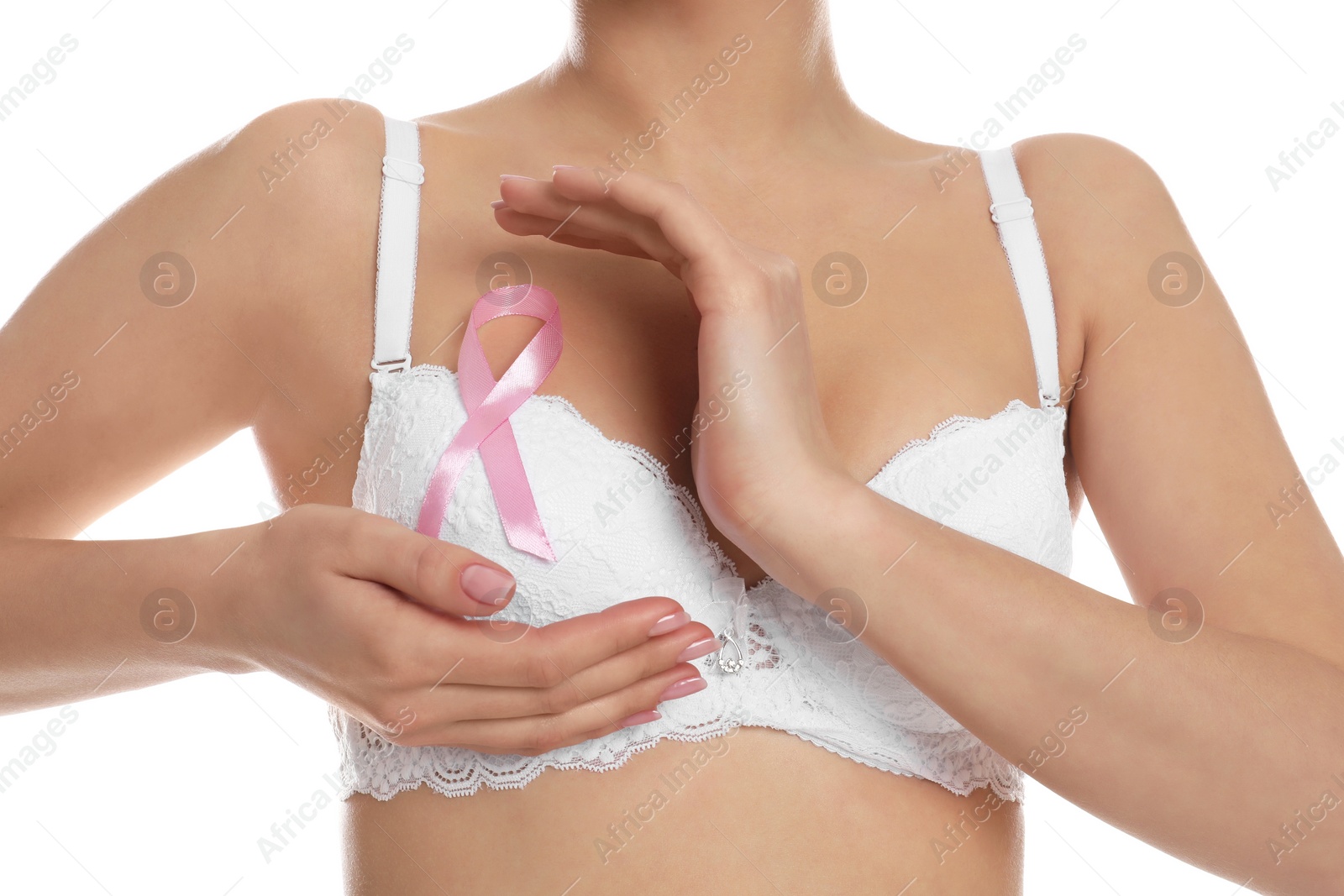 Photo of Woman with pink ribbon on white background, closeup. Breast cancer awareness