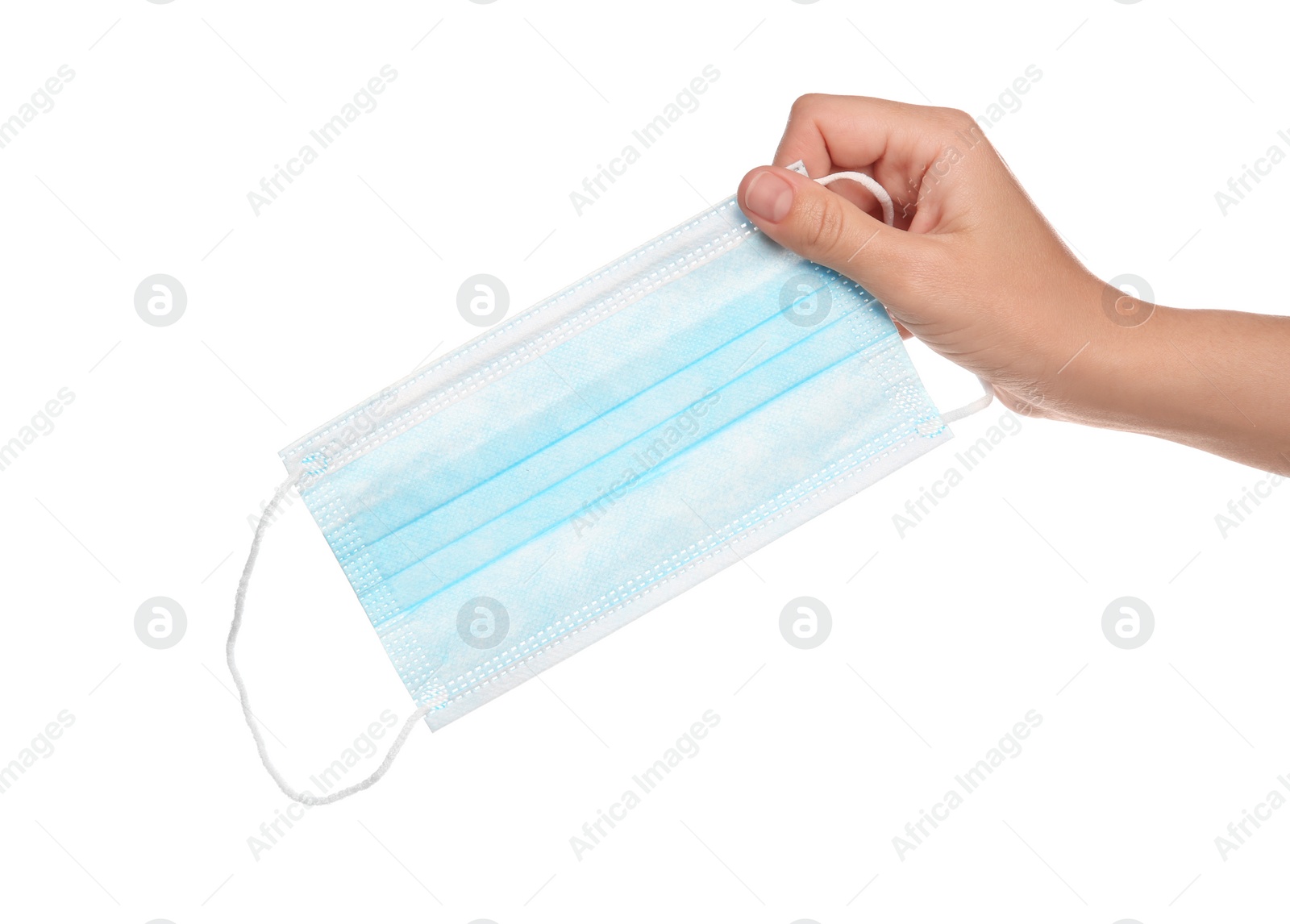Photo of Woman holding disposable face mask on white background, closeup. Protective measures during coronavirus quarantine