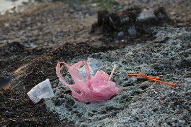 Plastic garbage at beach. Environmental pollution concept