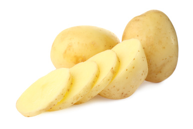 Photo of Whole and cut fresh raw organic potatoes on white background