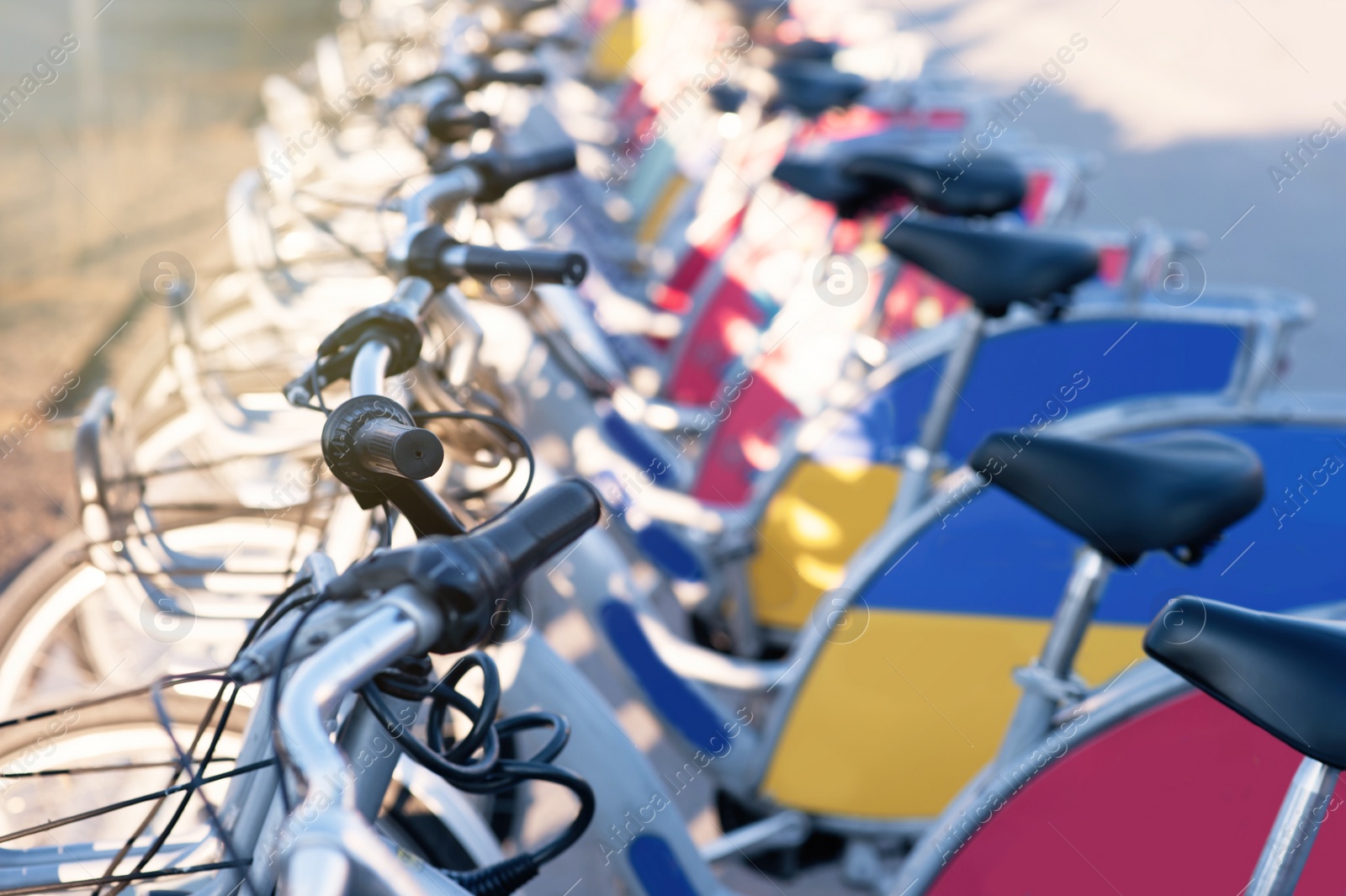 Photo of Parking with bicycles for rent on sunny day