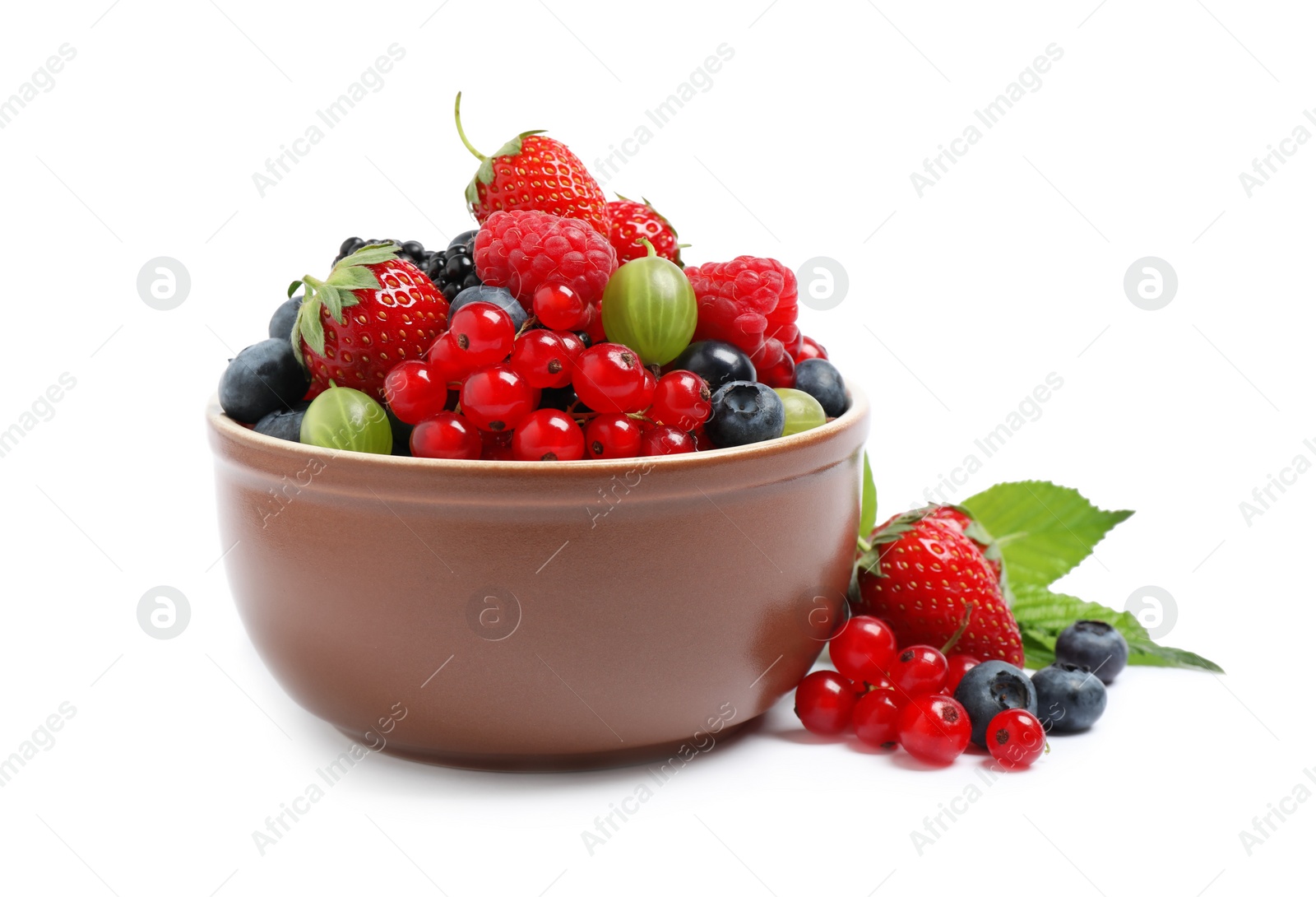 Photo of Mix of different fresh berries in bowl on white background