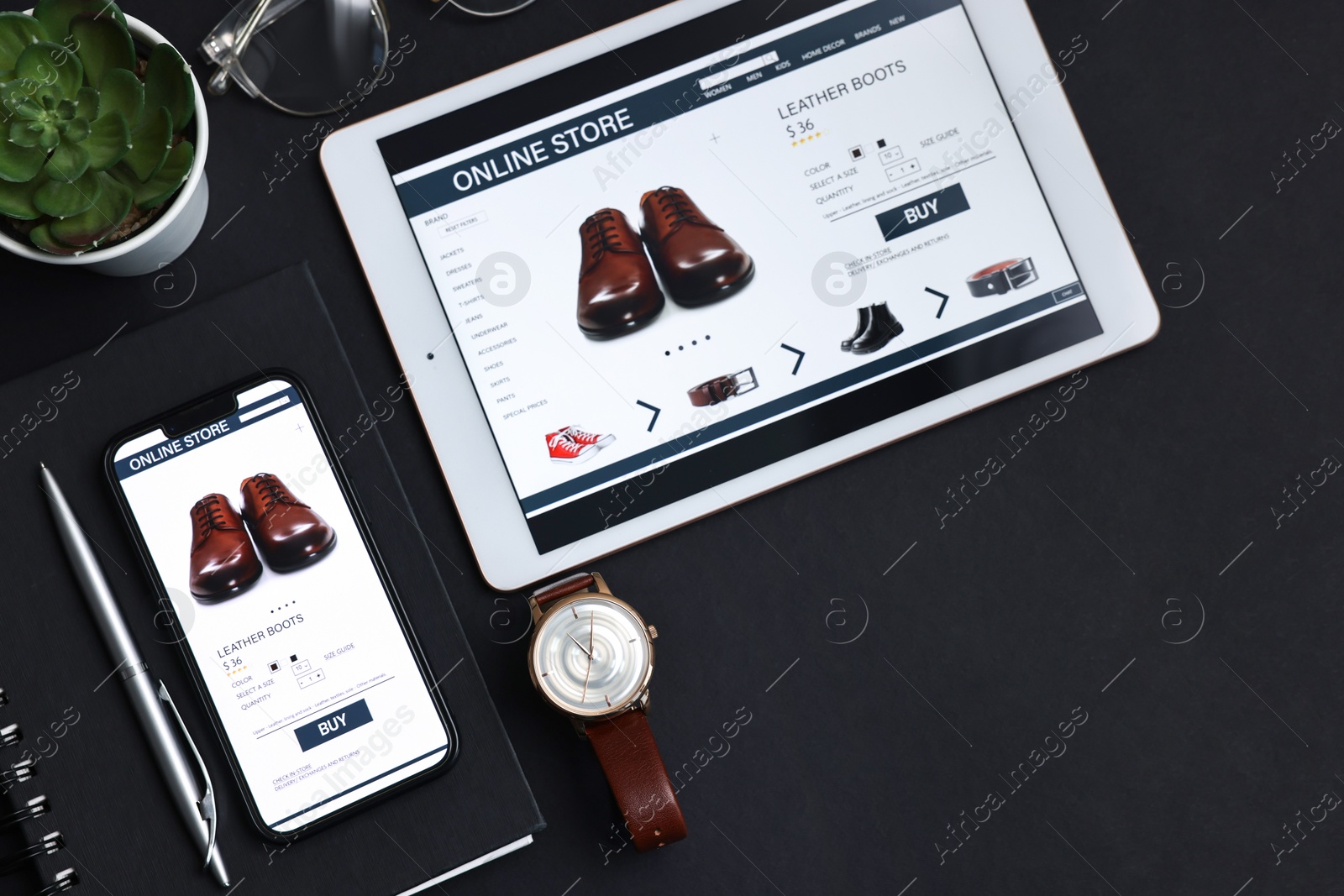 Photo of Online shopping. Flat lay composition with modern tablet and smartphone on black background