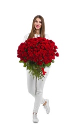 Full length portrait of beautiful woman with bouquet of roses on white background