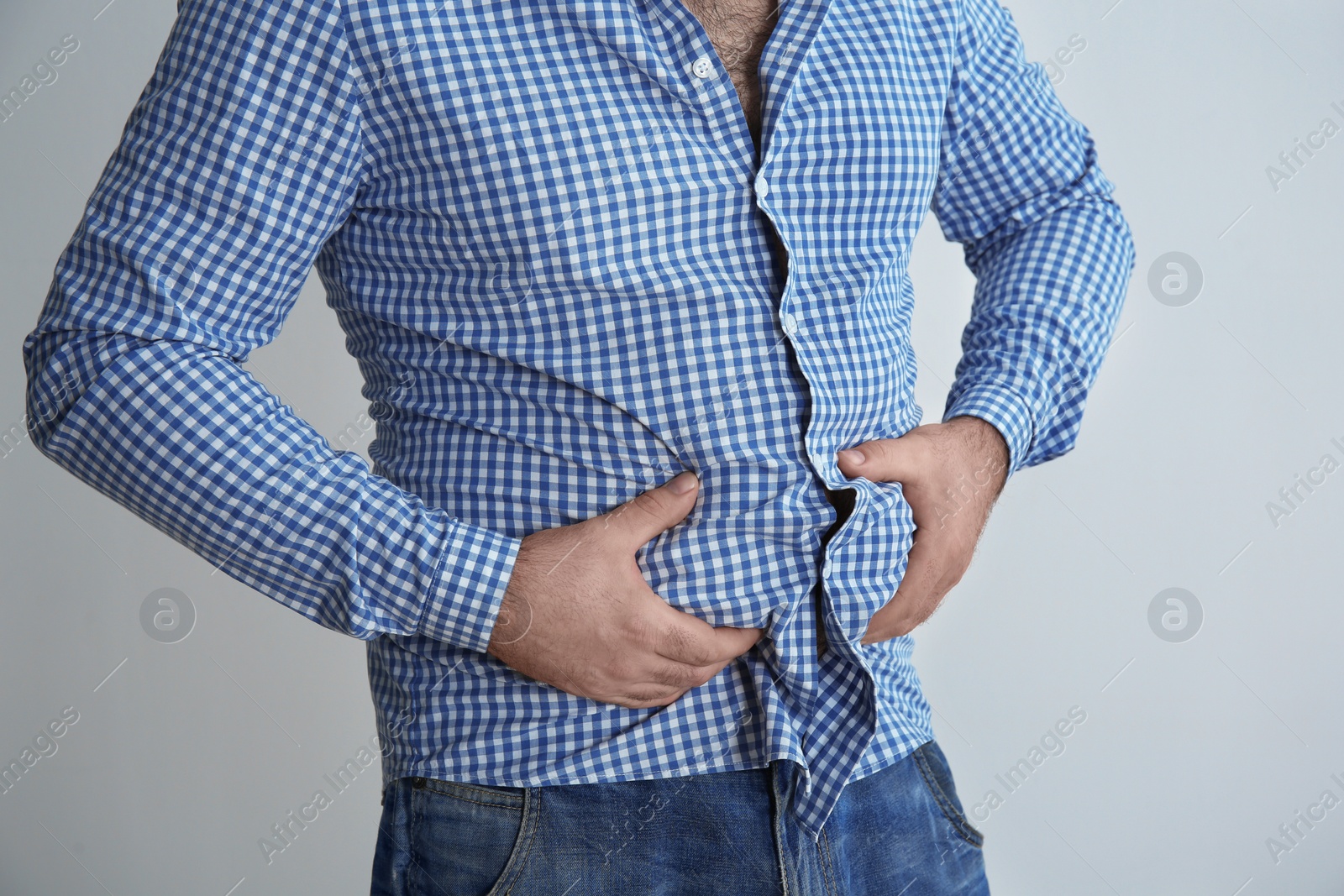 Photo of Overweight man on white background