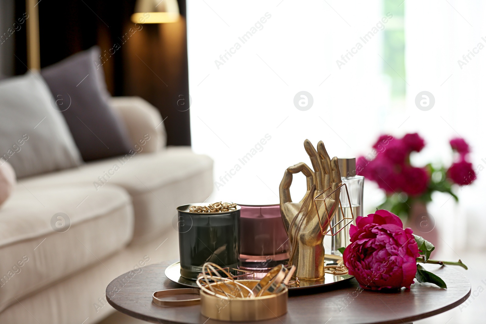 Photo of Composition with stylish accessories and interior elements on table indoors