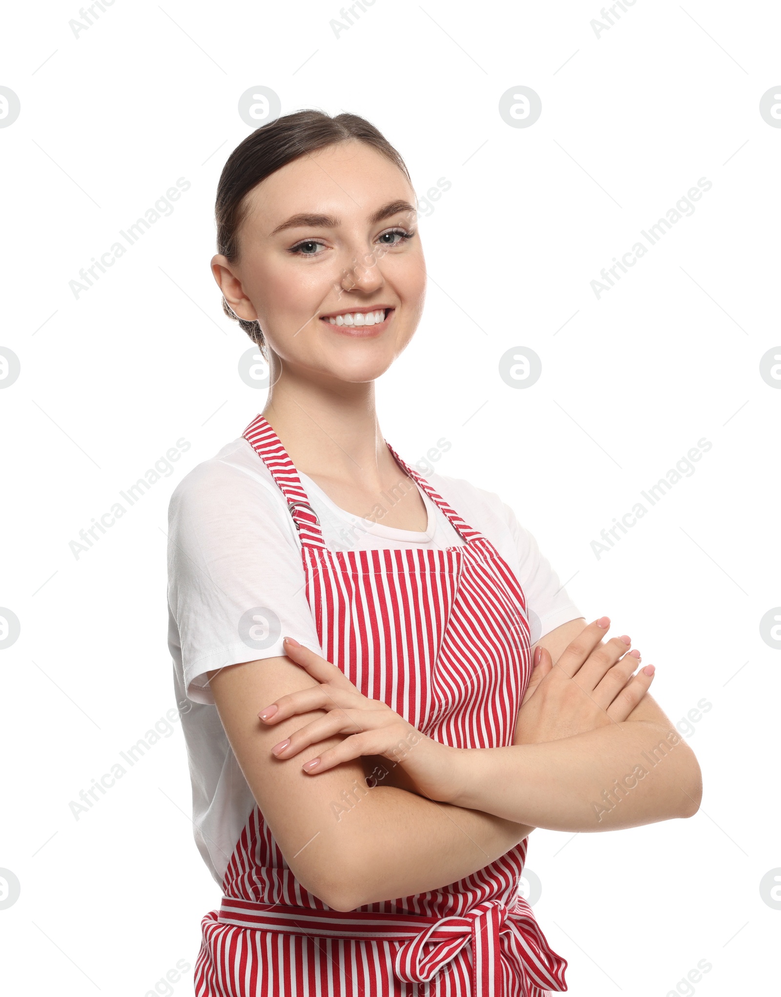 Photo of Beautiful young woman in clean striped apron on white background