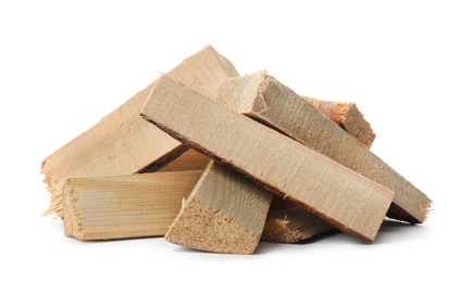 Photo of Cut firewood on white background. Heating in winter