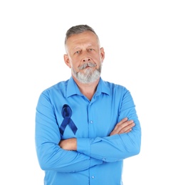 Photo of Mature man with blue ribbon on white background. Urological cancer awareness