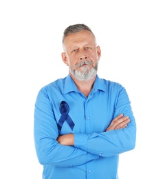 Mature man with blue ribbon on white background. Urological cancer awareness