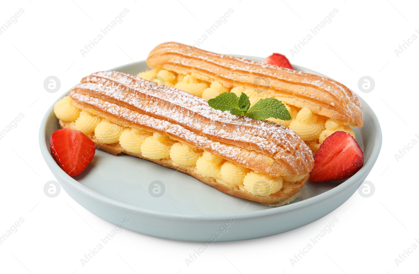 Photo of Delicious eclairs filled with cream, strawberries and mint isolated on white