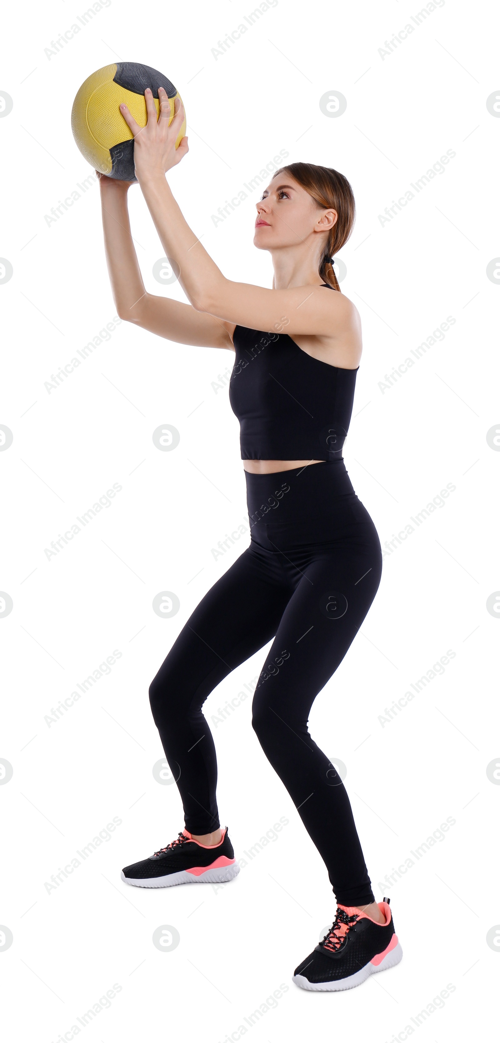 Photo of Athletic woman doing exercise with medicine ball isolated on white