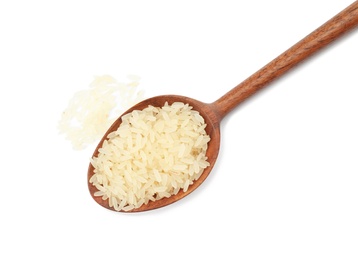 Spoon with uncooked rice on white background, top view