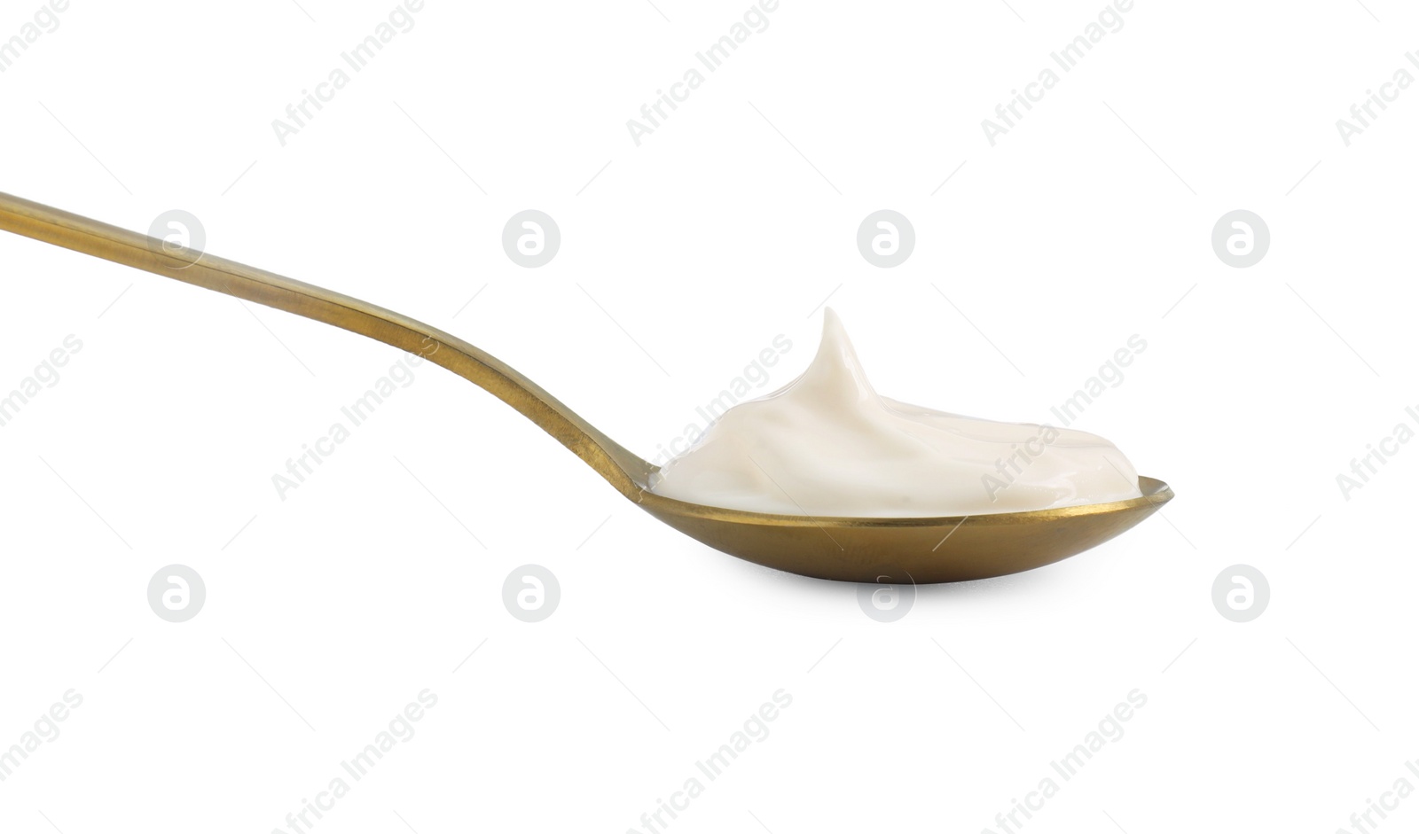 Photo of One golden spoon with mayonnaise isolated on white