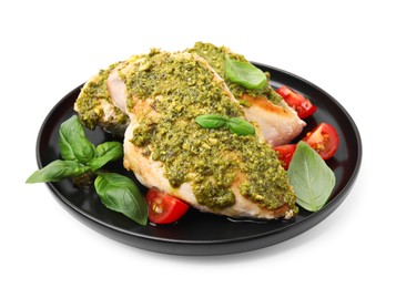 Delicious chicken breasts with pesto sauce, tomatoes and basil isolated on white