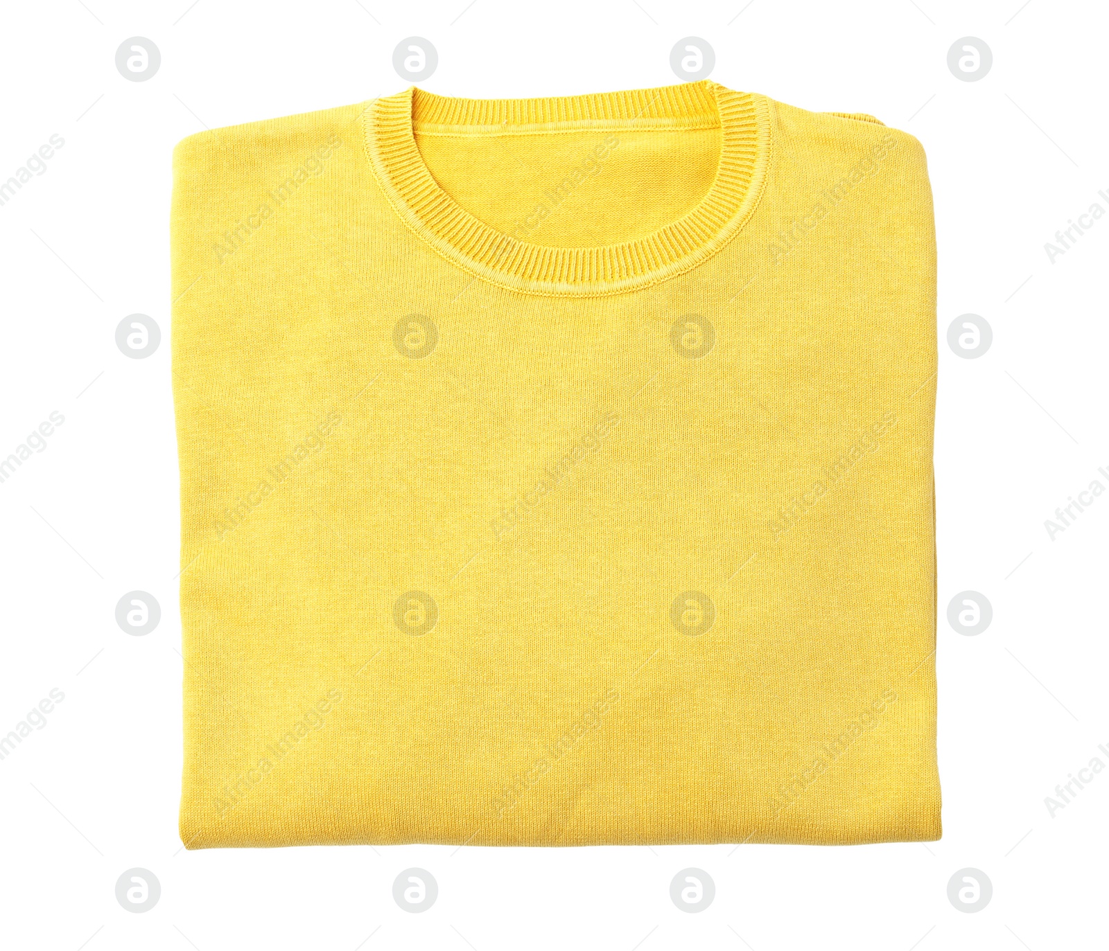 Photo of Folded yellow sweater isolated on white, top view