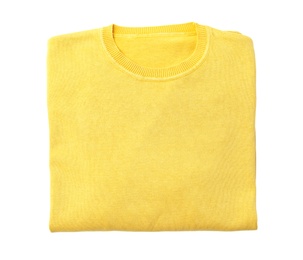 Photo of Folded yellow sweater isolated on white, top view