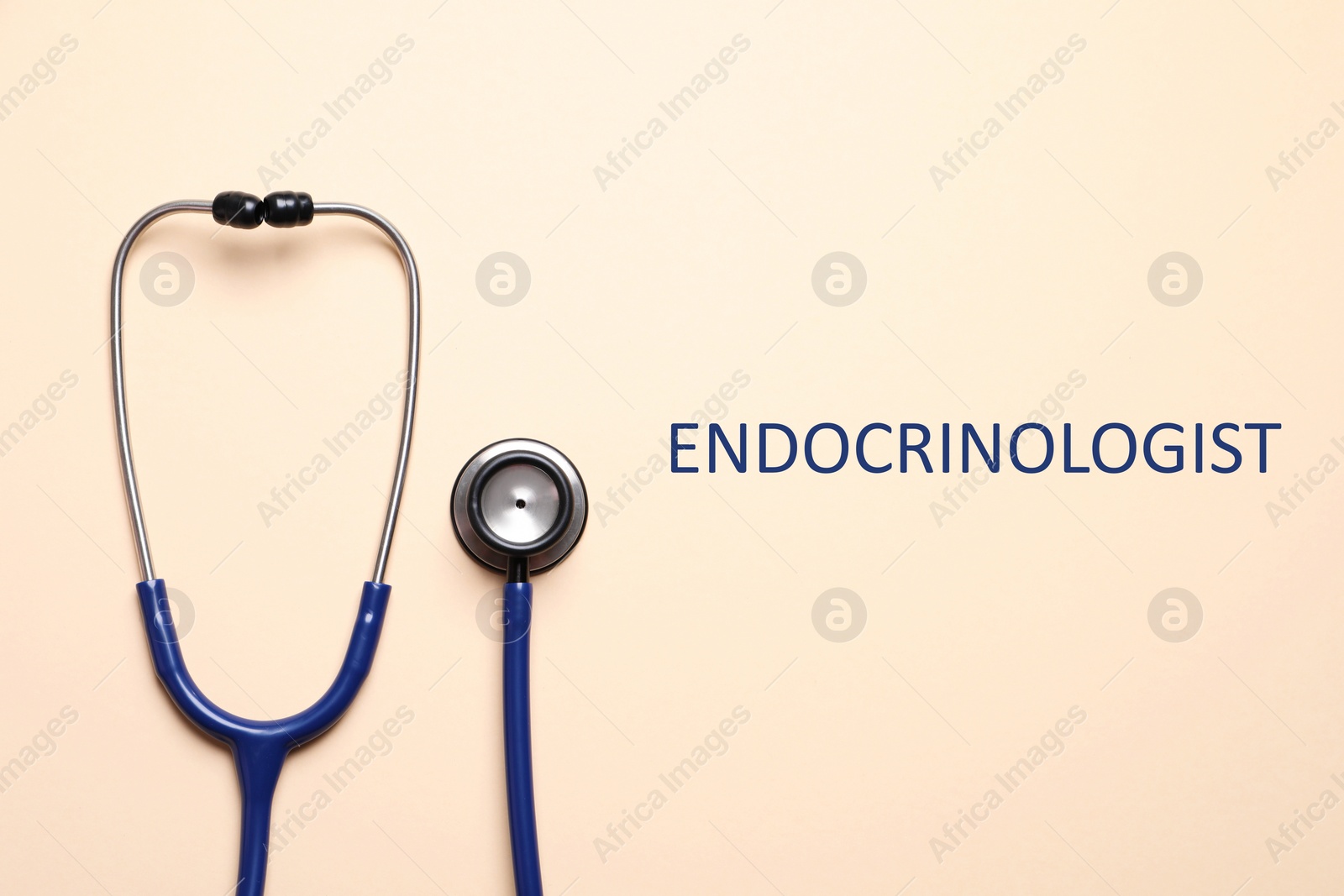 Image of Endocrinologist. Stethoscope on beige background, top view