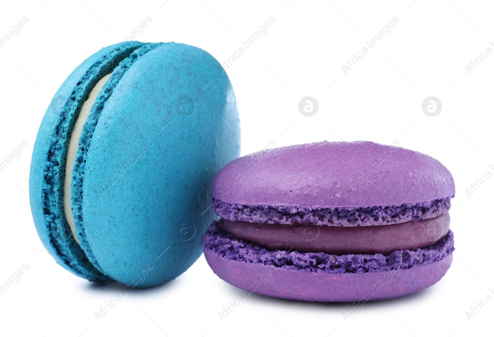 Photo of Different delicious colorful macarons on white background