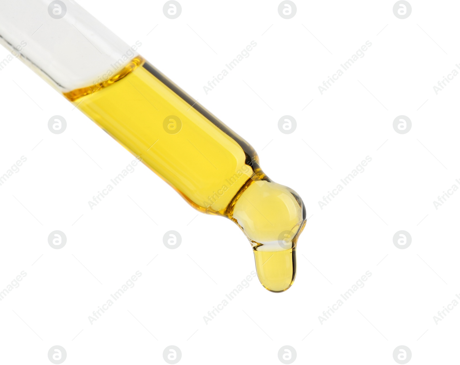 Photo of Dripping tincture from pipette isolated on white