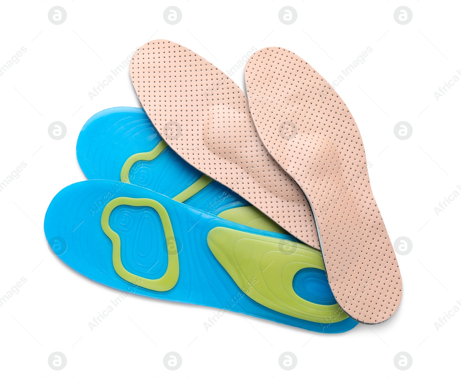 Photo of LIght blue and beige orthopedic insoles on white background, top view