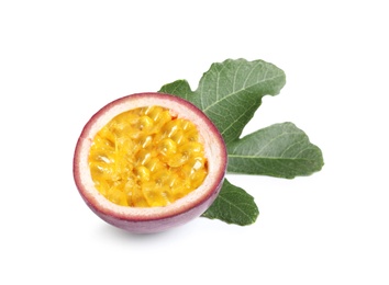 Half of delicious passion fruit (maracuya) and green leaf on white background